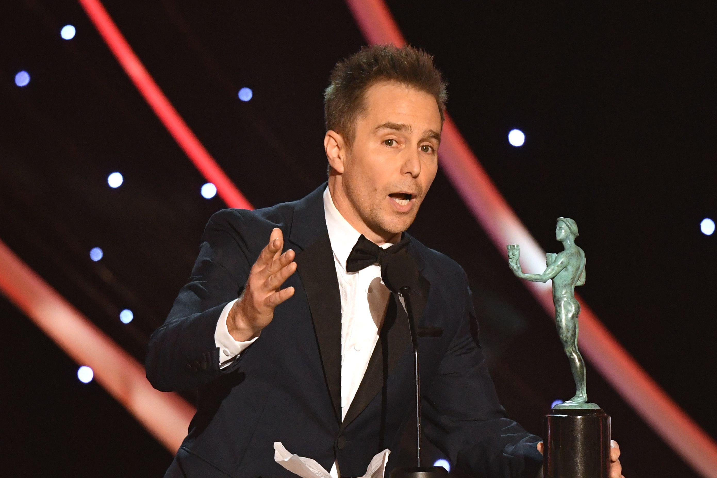 Sam Rockwell accepts the Outstanding Performance by a Male Actor in a Supporting Role award for 'Three Billboards Outside Ebbing, Missouri' onstage  during the 24th Annual Screen Actors Guild Awards show at The Shrine Auditorium on January 21, 2018 in Los Angeles, California. / AFP PHOTO / Mark RALSTON        (Photo credit should read MARK RALSTON/AFP/Getty Images)