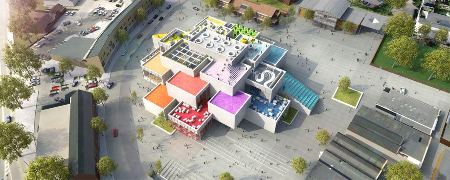 Næb Mig Tolk Lego House in Billund, Denmark, begins construction by laying giant Lego  brick–shaped foundation stones.