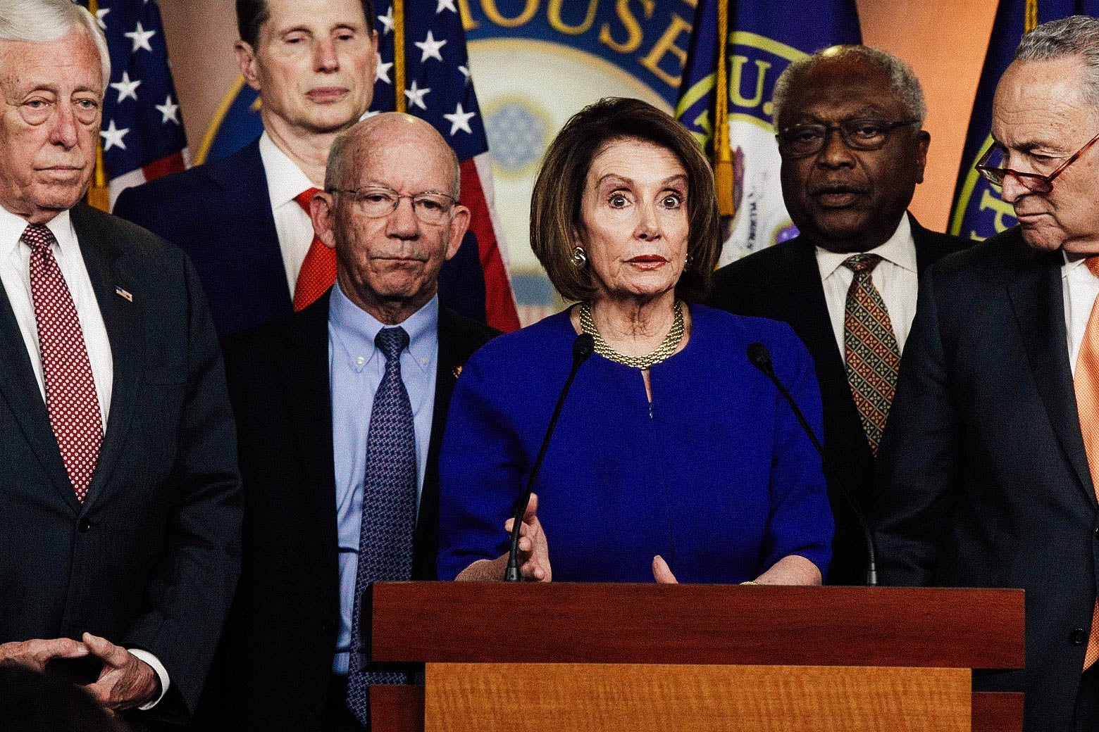 Speaker of the House Rep. Nancy Pelosi (center) speaks to the media as Senate Minority Leader Sen. Chuck Schumer and other congressional leaders listen on May 22 in Washington.