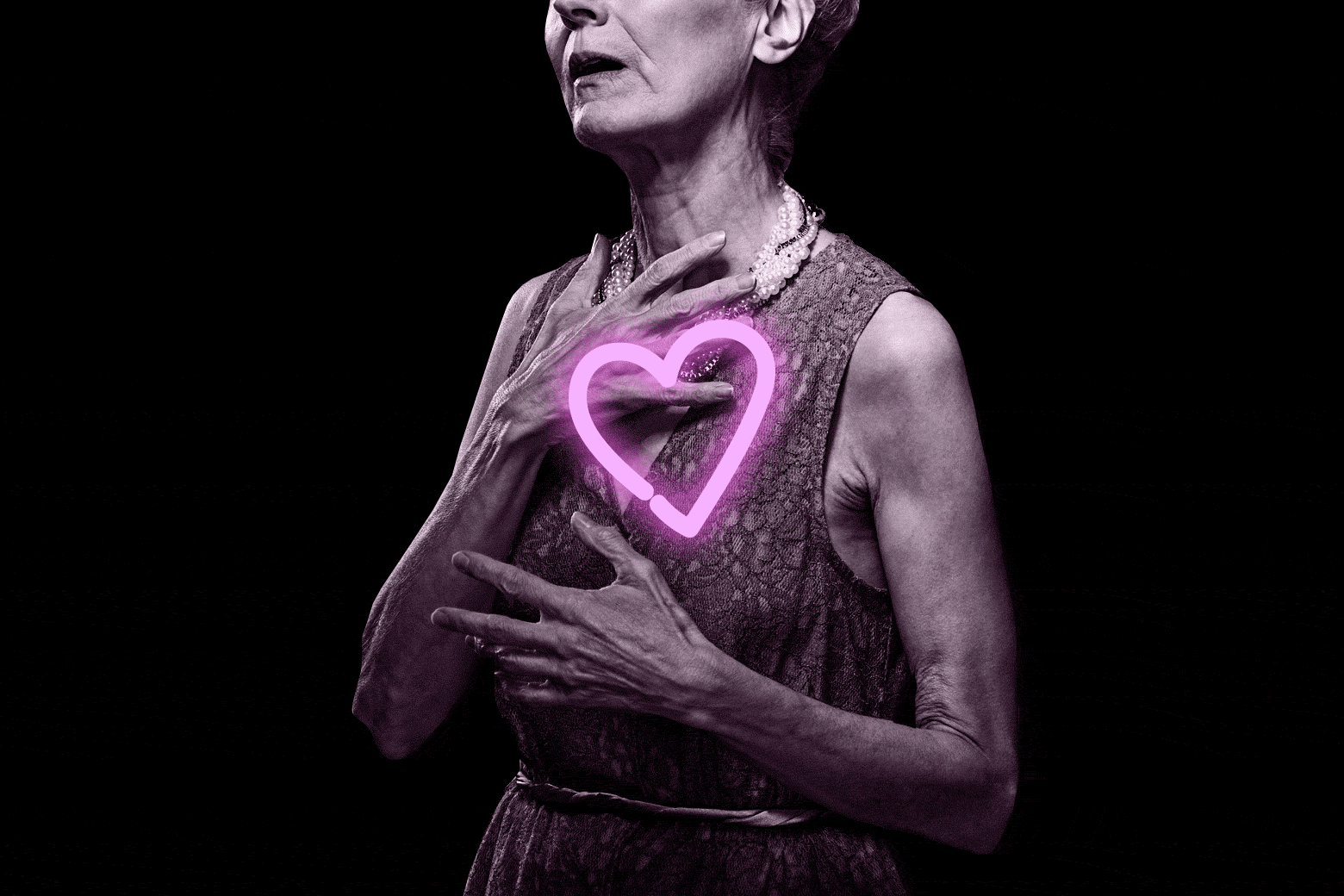An older woman clutches her chest as a neon heart glows around where her heart actually is.