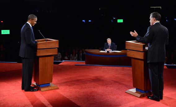 President Obama, left, listens as Republican presidential candidate Mitt Romney, right, speaks during the Presidential Debate.
