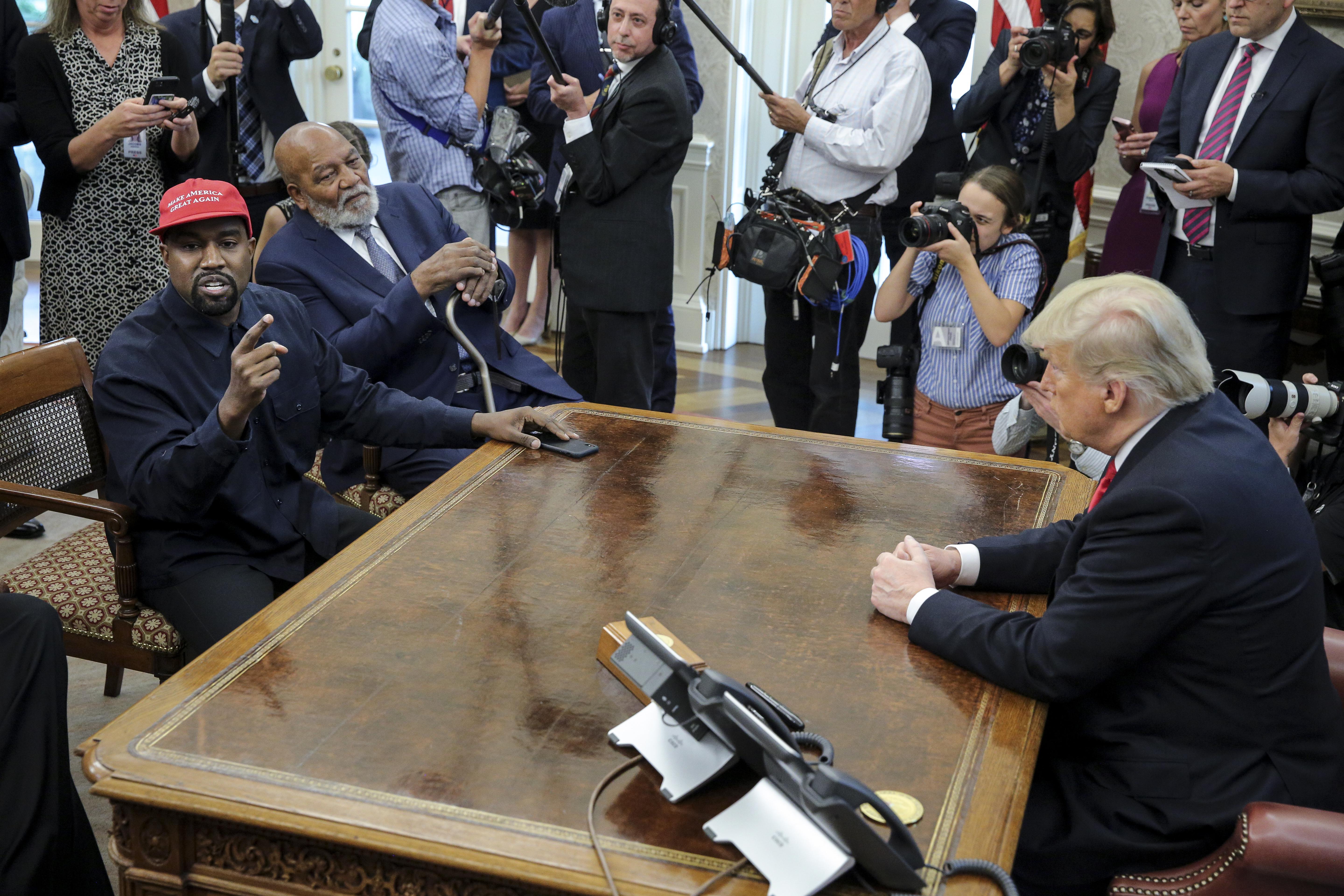 Kanye West and Donald Trump in the Oval Office.