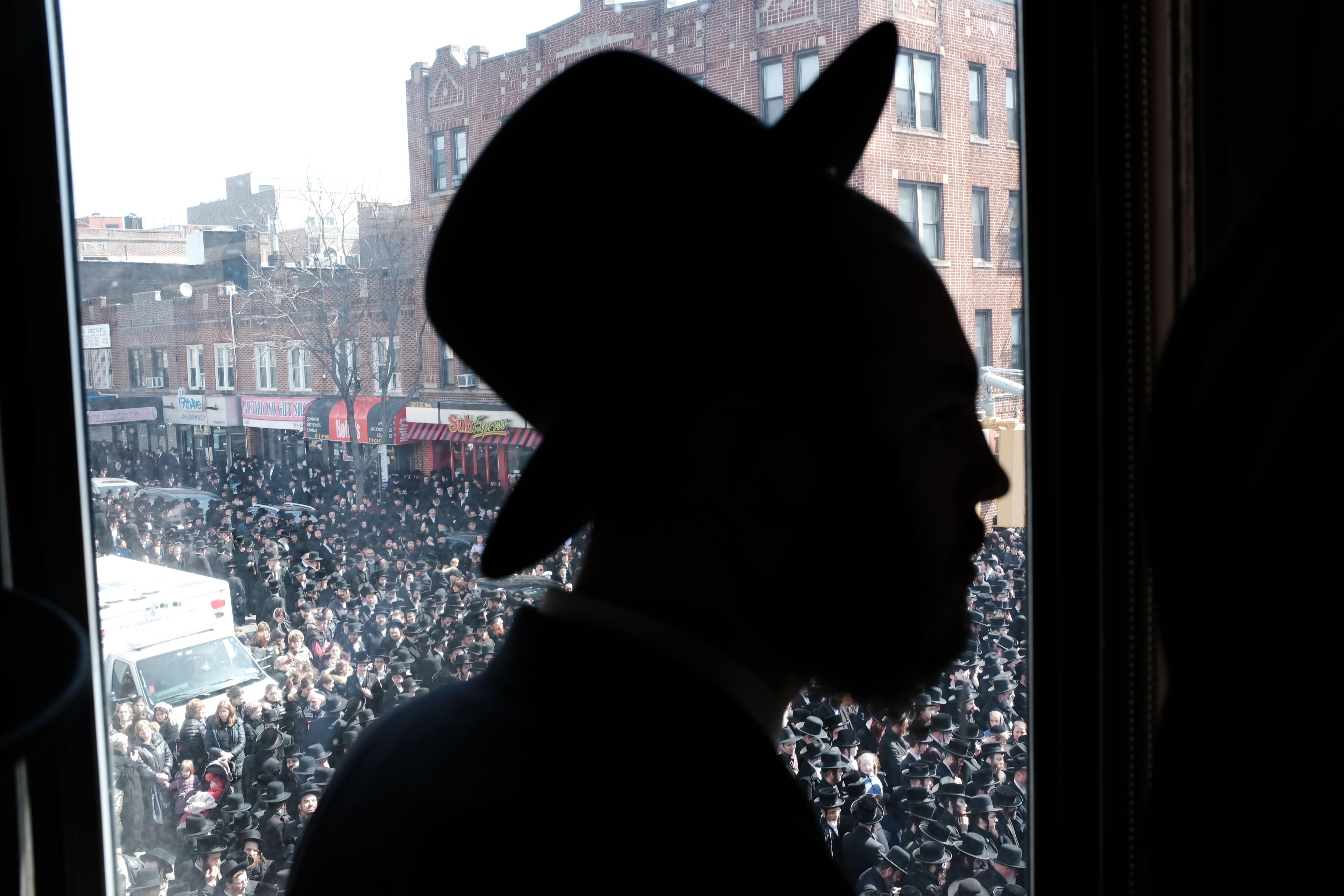 Thousands of mourners gather in Borough Park for the funeral of The Skulener Rebbe, Rabbi Yisroel Avrohom Portugal who died on Monday on April 2, 2019 in New York City. 