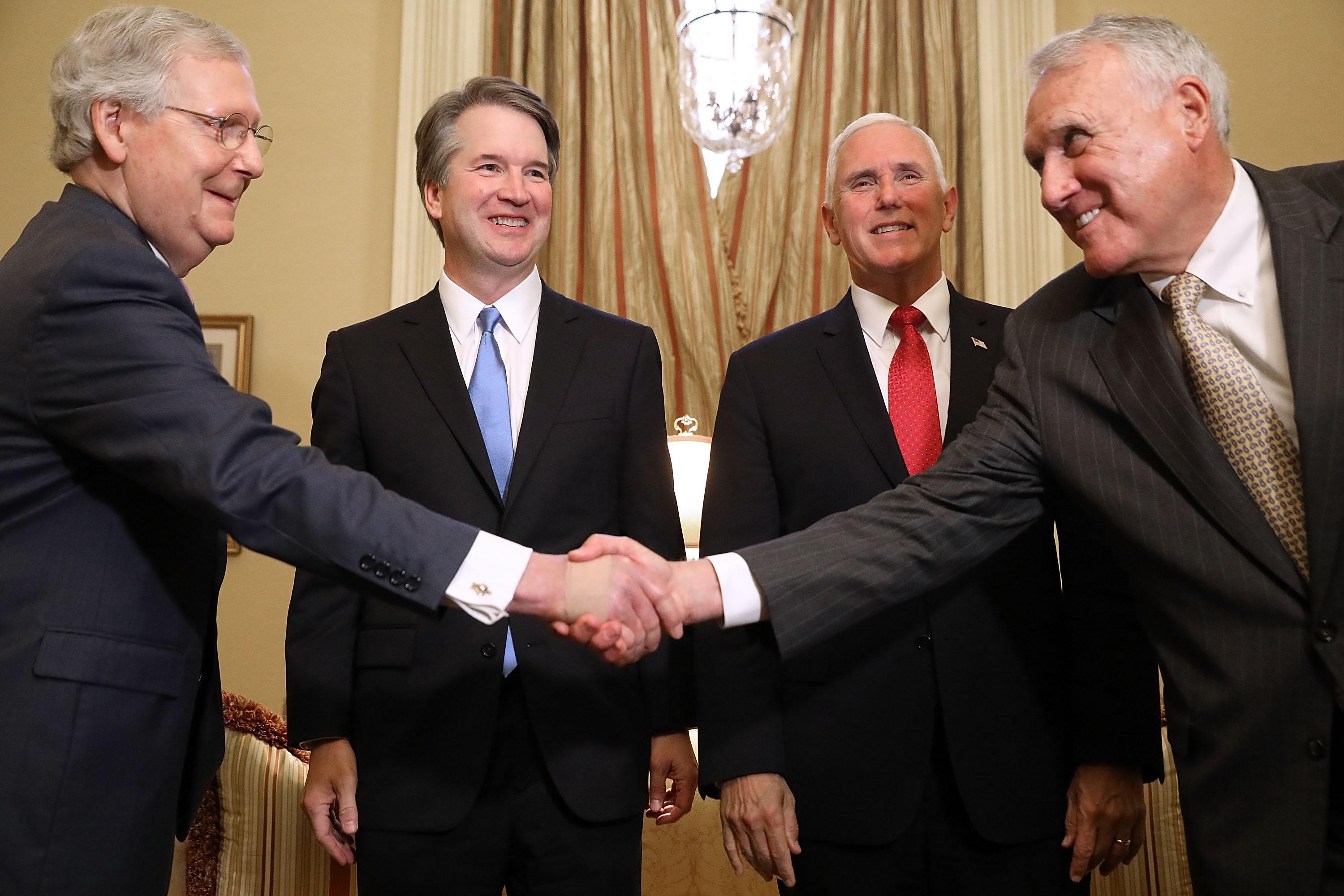 Senate Majority Leader Mitch McConnell, Judge Brett Kavanaugh, Vice President Mike Pence and former Sen. Jon Kyl greet one another before a July 2018 meeting.