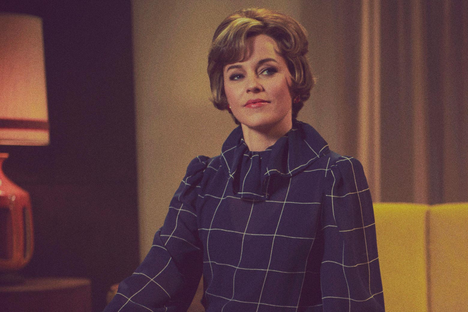 Elizabeth Banks in costume as Jill Ruckelshaus in Mrs. America