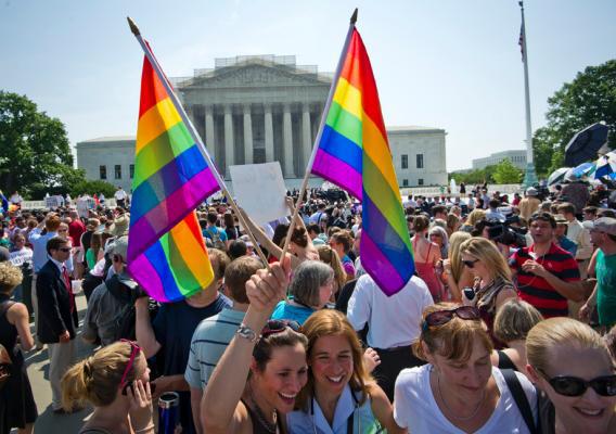 Hundreds of people gather outside the US Supreme Court building in Washington, DC on June 26, 2013 in anticipation of the ruling on California's Proposition 8, the controversial ballot initiative that defines marriage as between a man and a woman. 