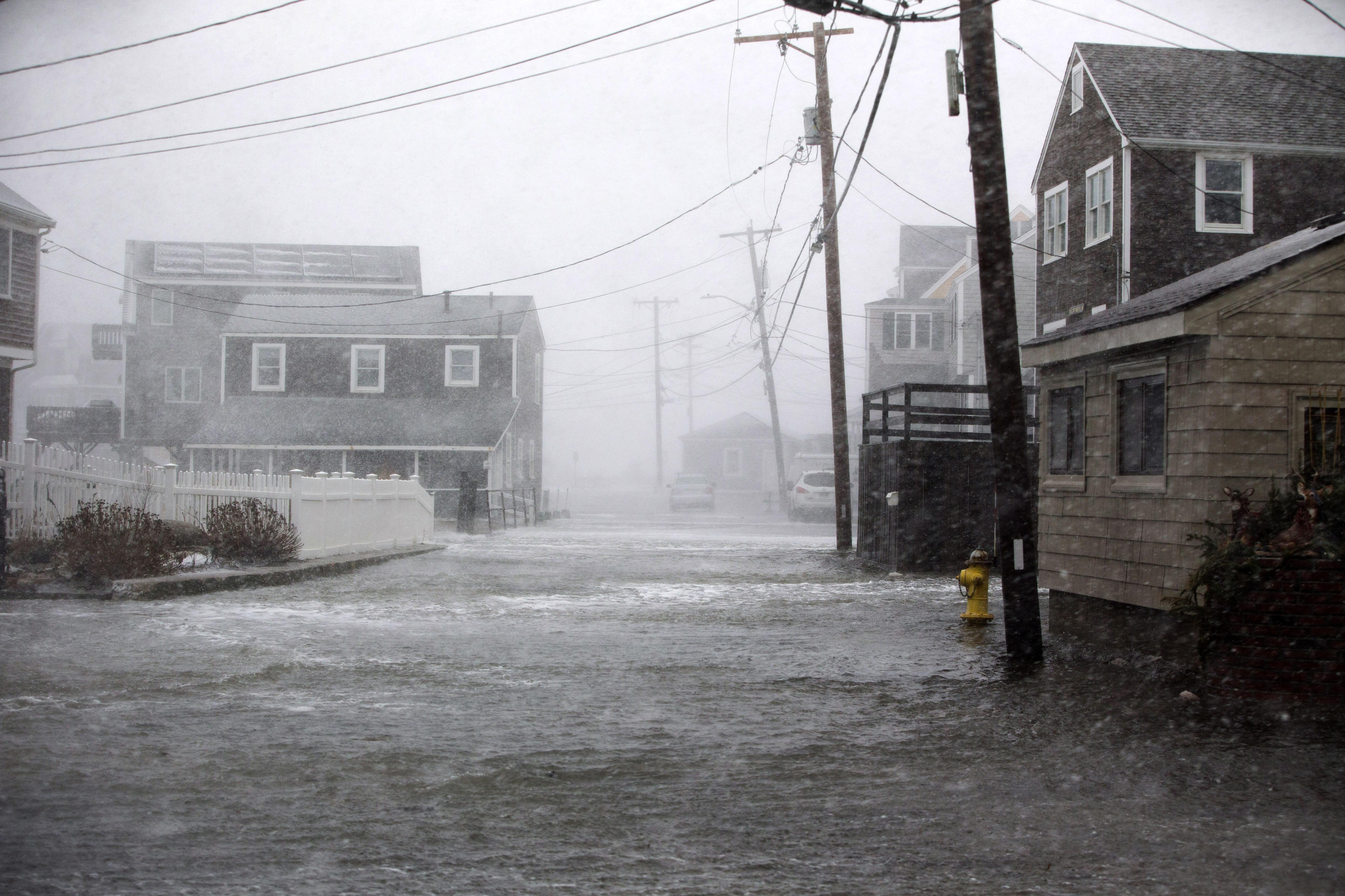 SCITUATE, MA - JANUARY 04: Lighthouse Rd. begins to flood as a massive winter storm begins to bear down on the region on January 4, 2018 in Scituate, Massachusetts. The 'bomb cyclone' was expected to dump heavy snows in New England as the storm system moved up the U.S. east coast.  (Photo by Scott Eisen/Getty Images)