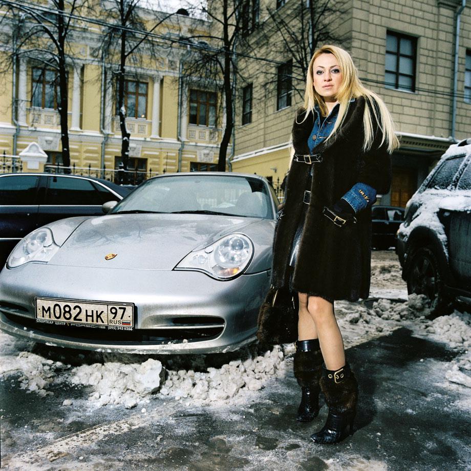 Moscow. Yana Rutskovskaya founded and runs the company Grand La Scala (100 employees), which owns beauty salons and luxury boutiques in Moscow and southern Russia. Photographed here in front of her car, opposite her beauty salon, Frank Provost.