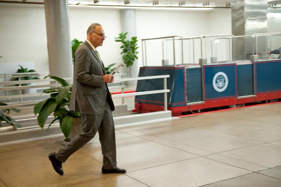 Sen. Charles Schumer, D-NY., make his way from the U.S. Capitol to the Senate Subway on April 10, 2013.