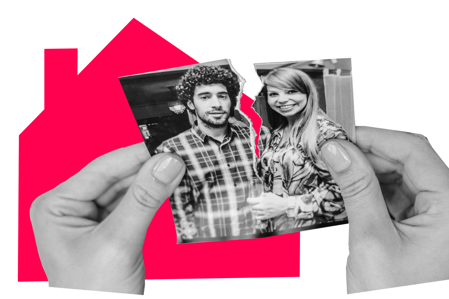 Hands tearing apart a photo of a couple in front of a silhouette of a house