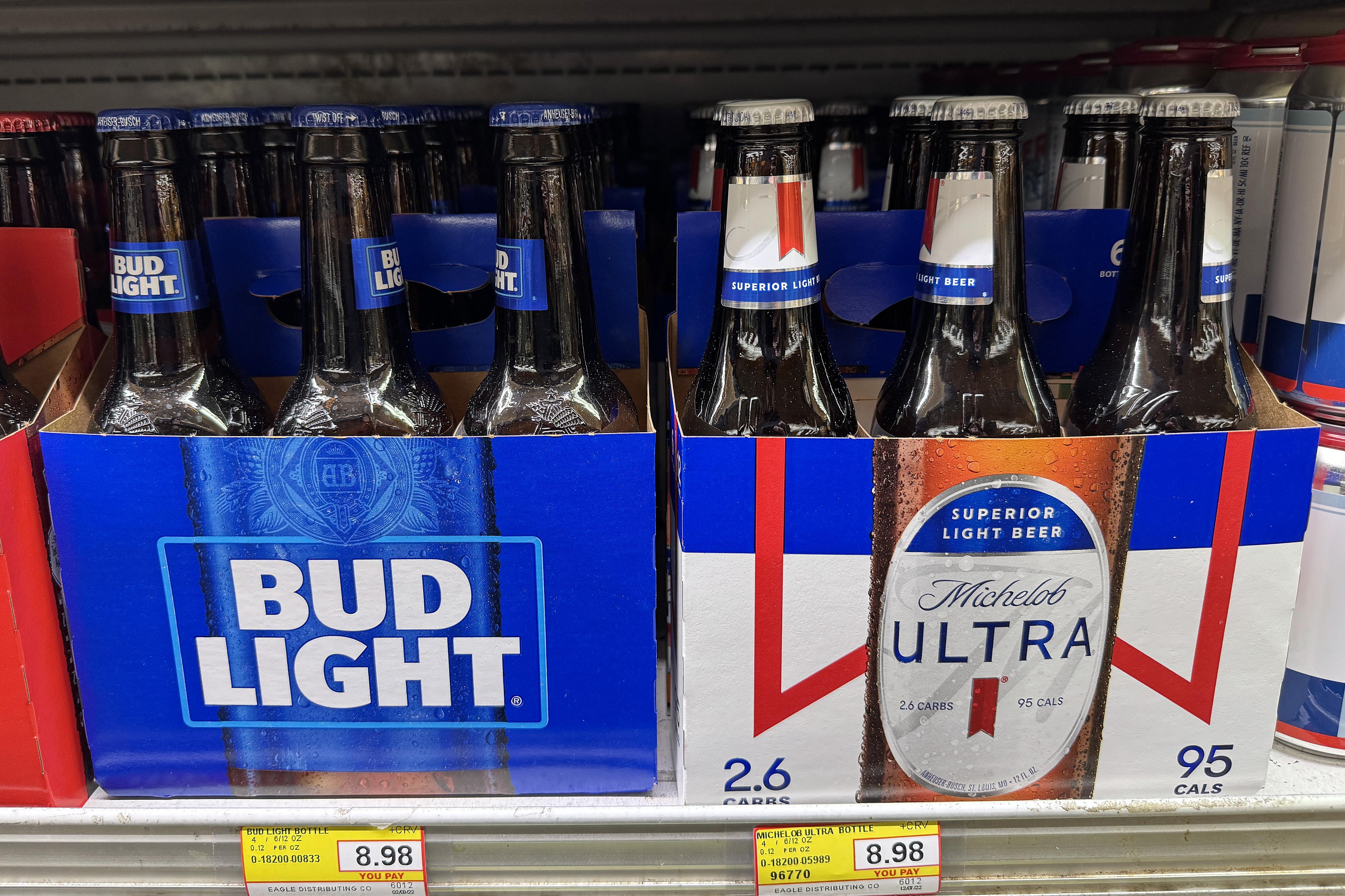  Six packs of Michelob Ultra and Bud Light are displayed at a grocery store on December 16, 2024 in San Anselmo, California. According to data from Draftlines Technologies, the Anheuser-Busch InBev beer Michelob Ultra has overtaken Bud Light as the most popular beer on tap in the United States. (Photo by Justin Sullivan/Getty Images)