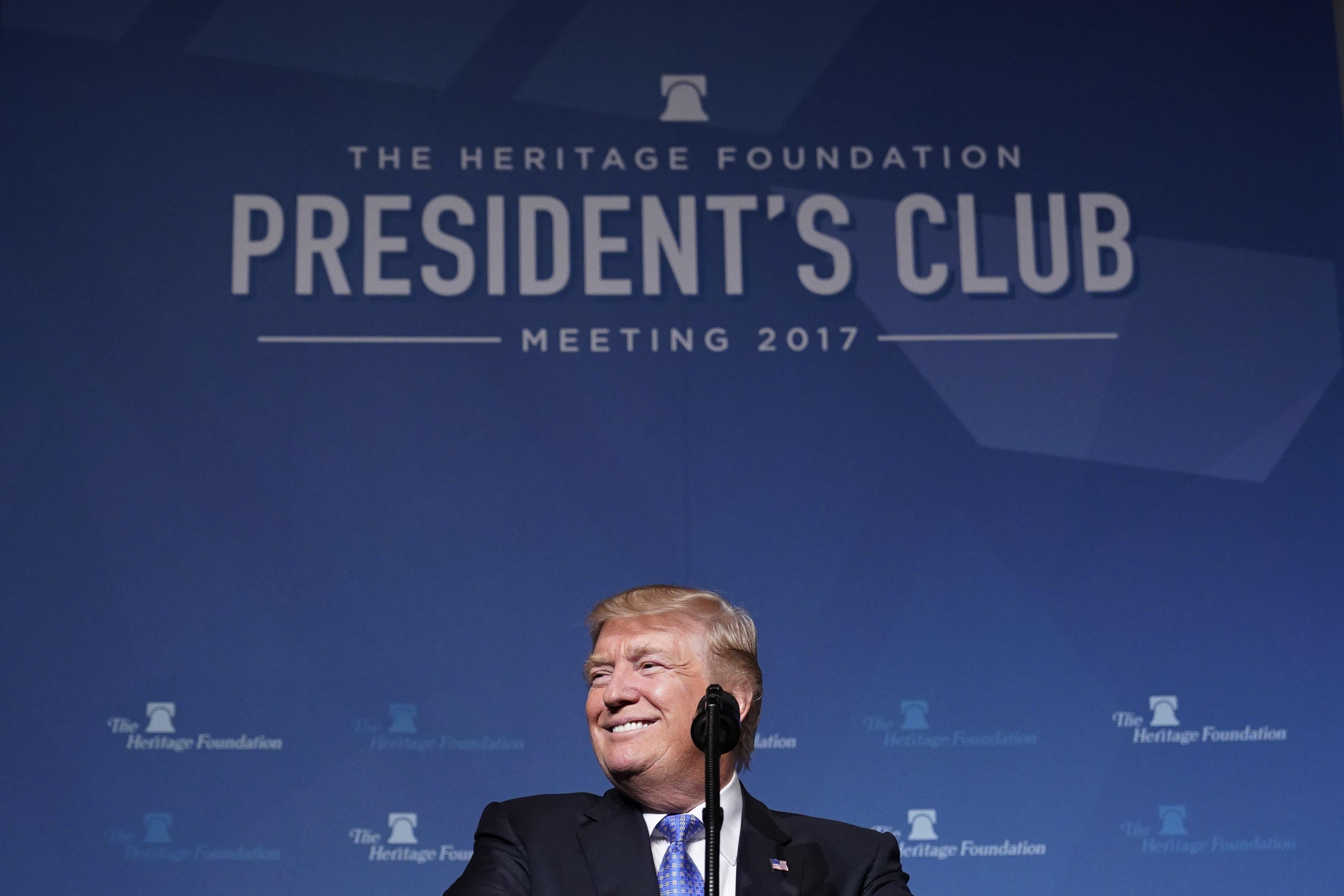 President Donald Trump smiles while delivering a speech on tax reform at the Heritage Foundation's President's Club Meeting at a hotel in Washington on Tuesday. 