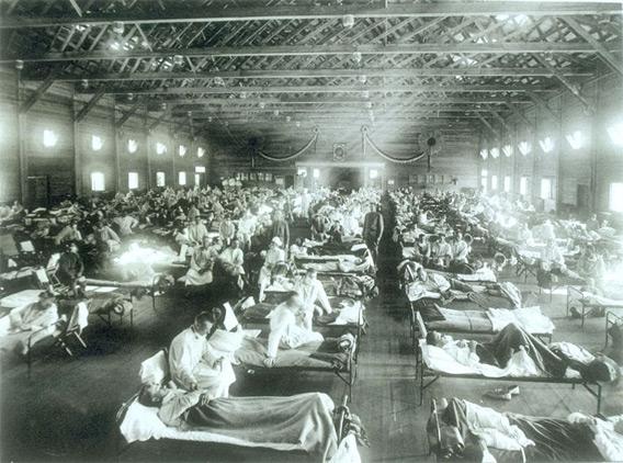 Historical photo of the 1918 Spanish influenza ward at Camp Funston, Kansas.