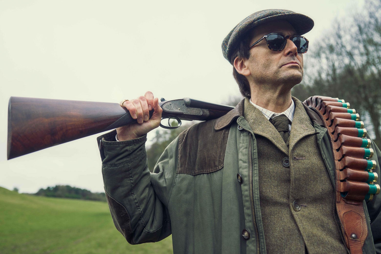 David Tennant's Tony in English countryside hunting gear.