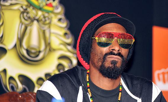 Rapper Snoop Dogg poses during a press conference in Mumbai.