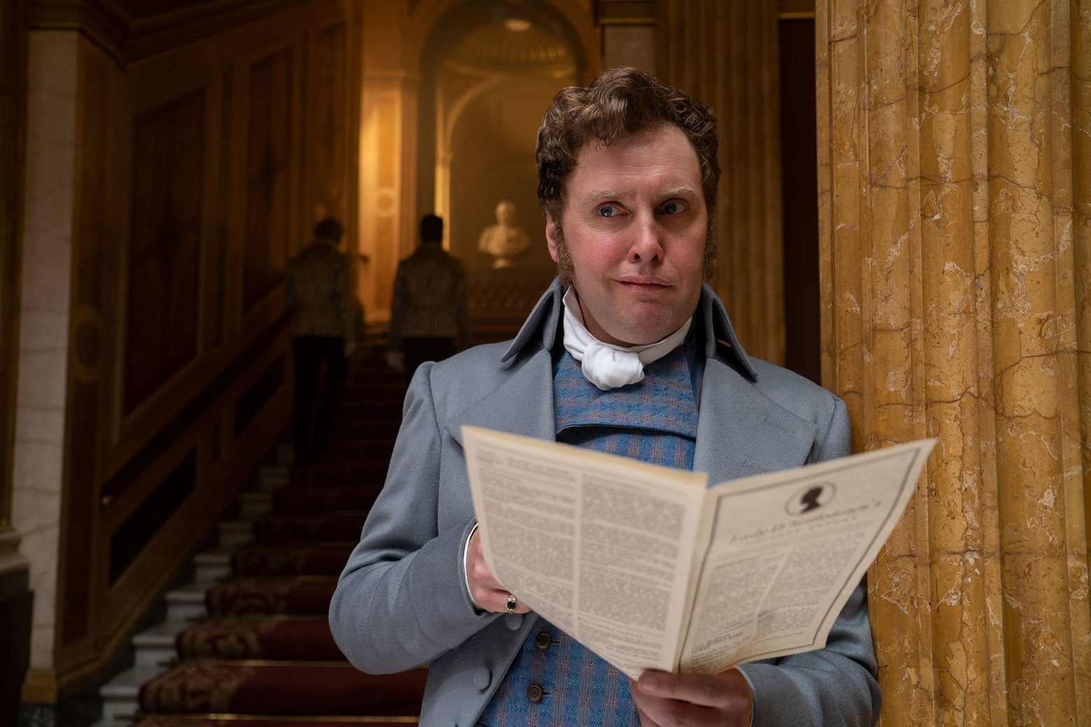 Nigel Berbrooke (played by Jamie Beamish) reading Lady Whistledown's Society Papers.