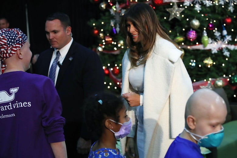 WASHINGTON, DC - DECEMBER 07:  First lady Melania Trump greets children after reading the Christmas book, The Polar Express at Children's National Medical Center, on December 7, 2017 in Washington, DC. First ladies dating back to Jacqueline Kennedy have made the annual visit to the Washington area hospital during the holiday season.  (Photo by Mark Wilson/Getty Images)