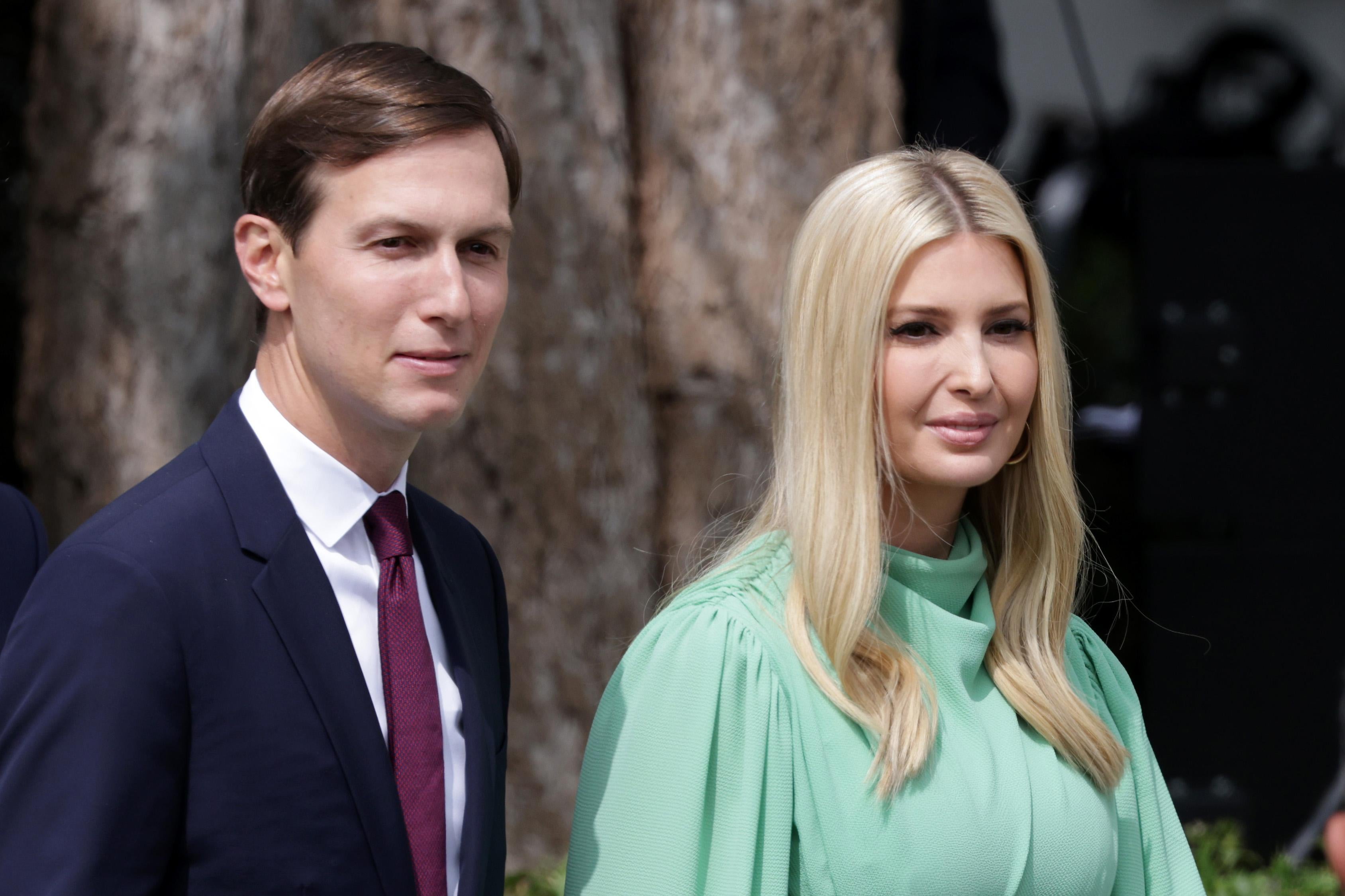 Jared Kushner and Ivanka Trump smiling, dressed up for an event on the South Lawn