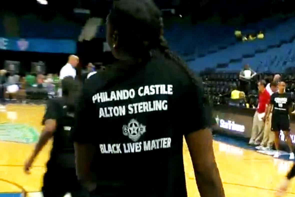 Close-up on the back of a player's shirt, which reads "Philando Castile Alton Sterling Black Lives Matter"
