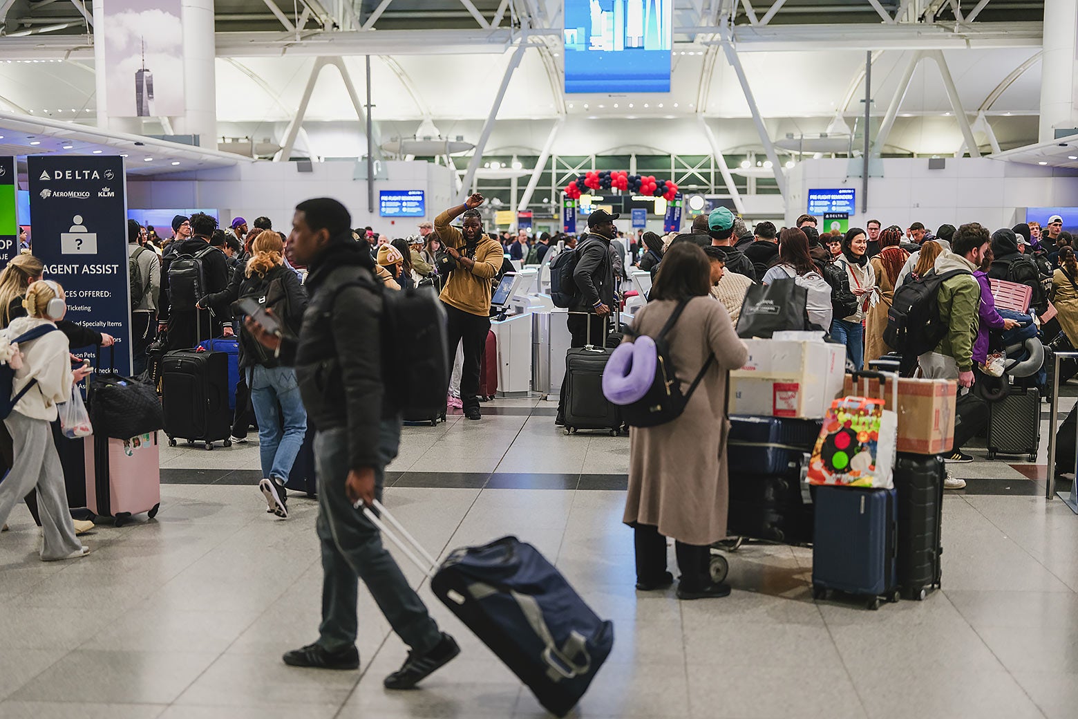People jammed into JFK airport. 