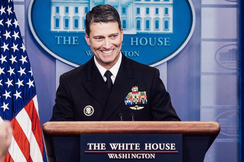Ronny Jackson stands at the podium at a White House press briefing. 