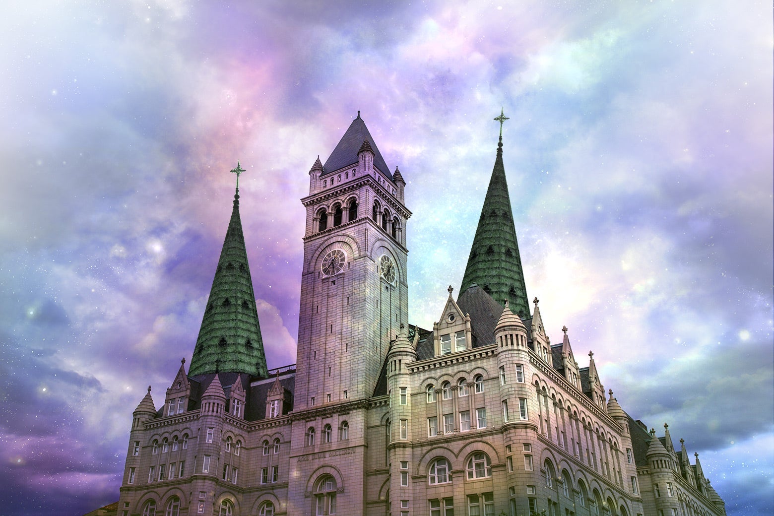 Exterior of the Trump International Hotel in D.C., photoshopped to be bathed in colorful, heavenly light.