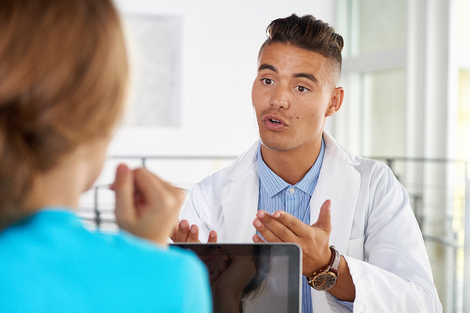 A doctor talking down a colleague.