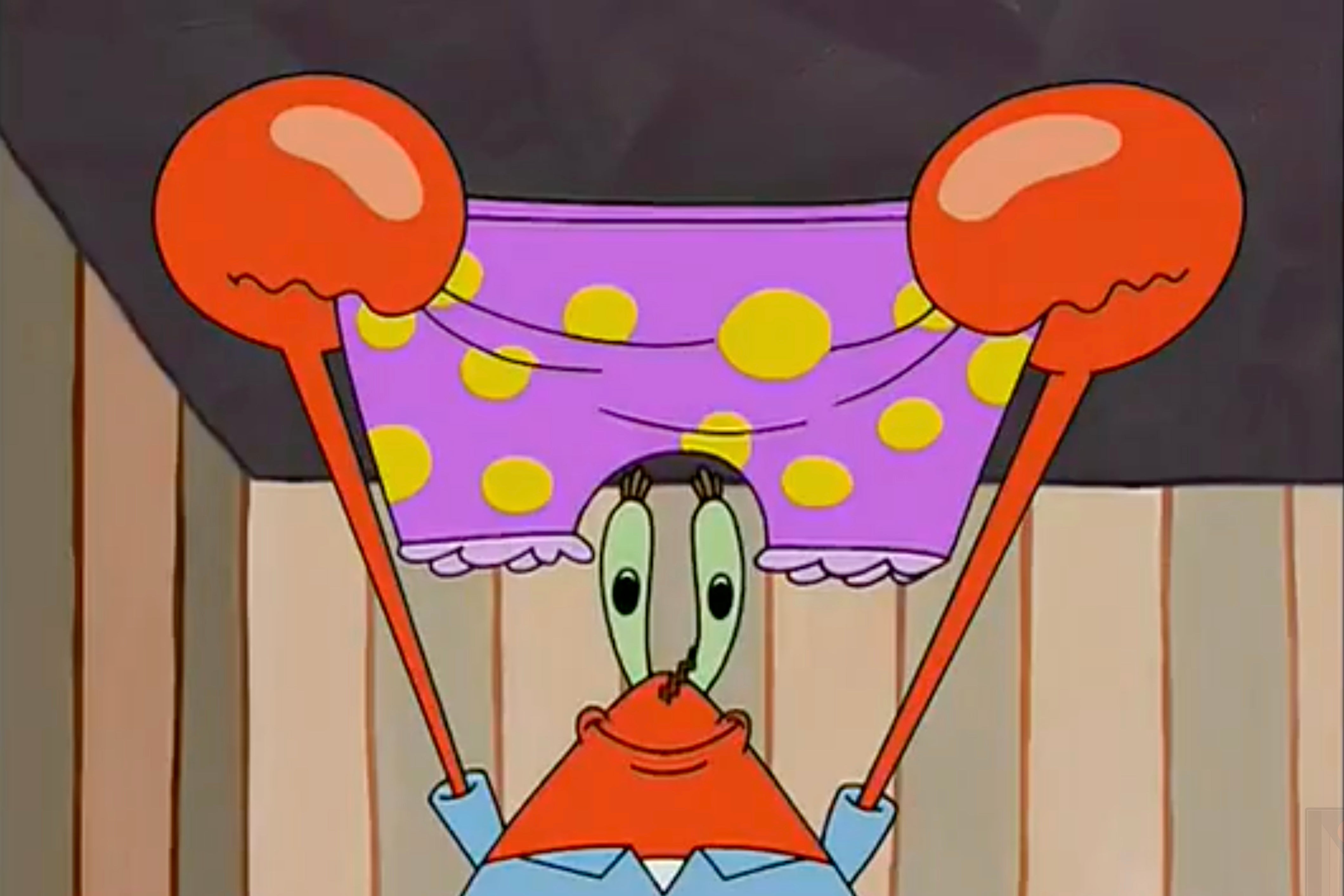 Mr Krabs holds up a pair of granny panties.