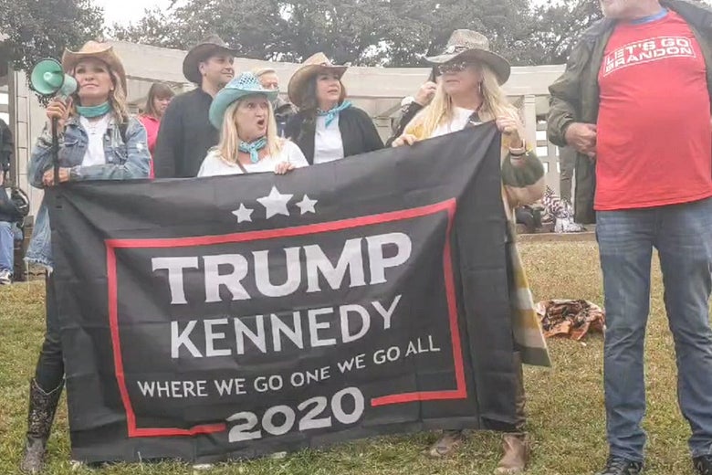 Trump-supporting QAnon conspiracists crowd Dealey Plaza hoping to see JFK Jr. announce that he's still alive.