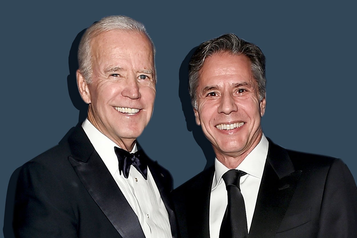 Joe Biden and Antony Blinken in dress attire.