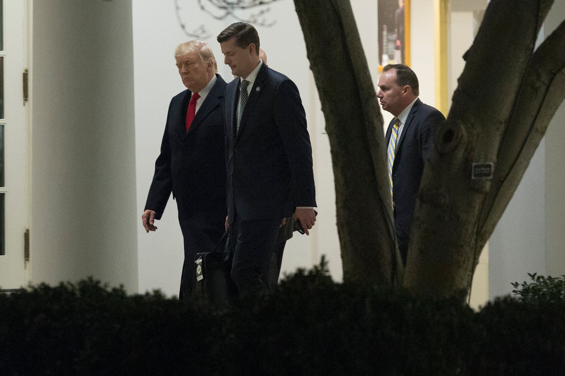 Donald Trump with Rob Porter and Utah Sen. Mike Lee on Dec. 4, 2017.