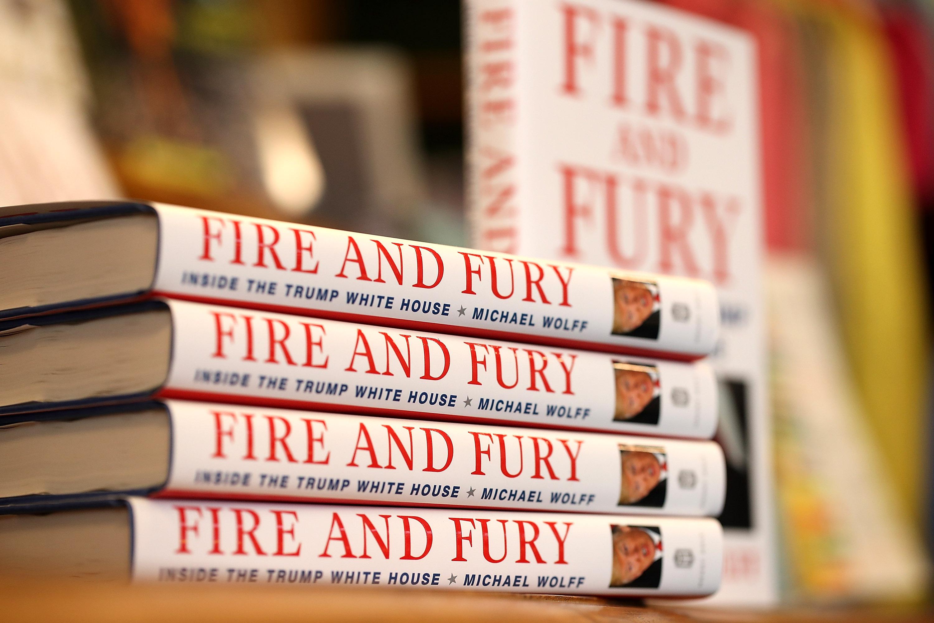 Copies of the book Fire and Fury by author Michael Wolff are displayed on a shelf at a bookstore