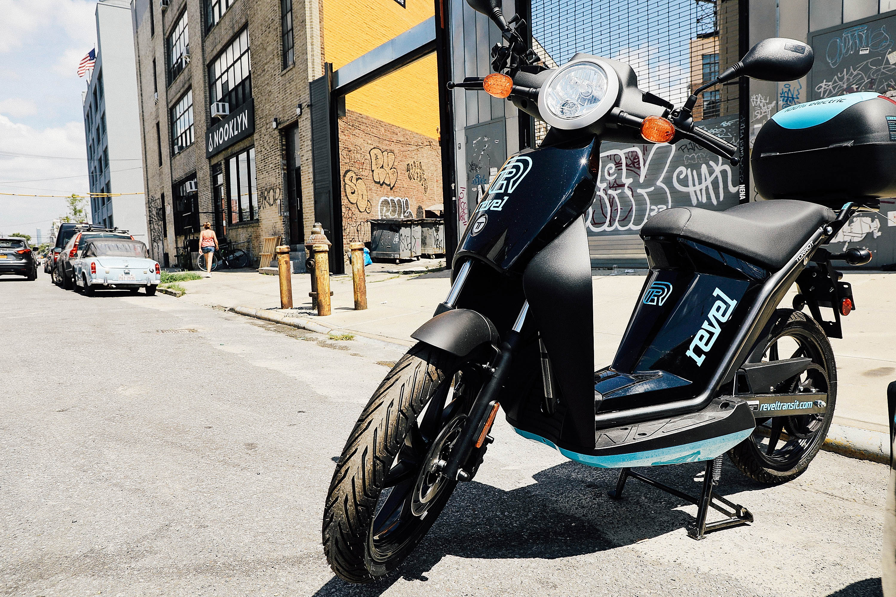 A Revel moped sits outside the company's headquarters.