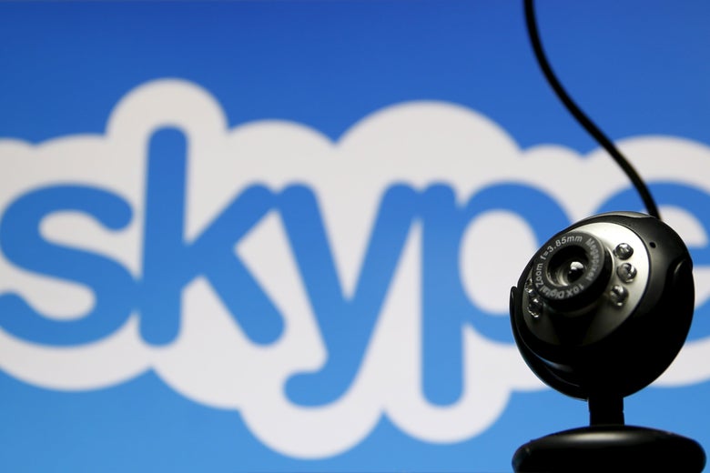 A webcam in front of the Skype logo