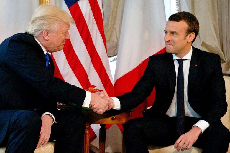 President Donald Trump shakes hands with French President Emmanuel Macron ahead of a working lunch, at the US ambassador's residence, on the sidelines of the NATO (North Atlantic Treaty Organization) summit, in Brussels, on May 25, 2017.