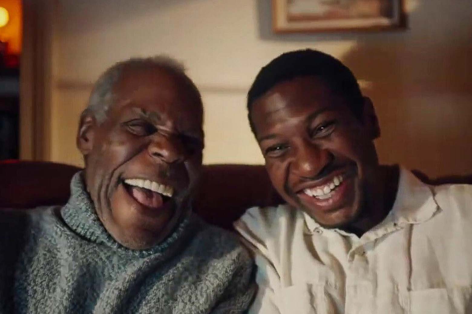 Danny Glover and Jonathan Majors laugh in this still from The Last Black Man in San Francisco.