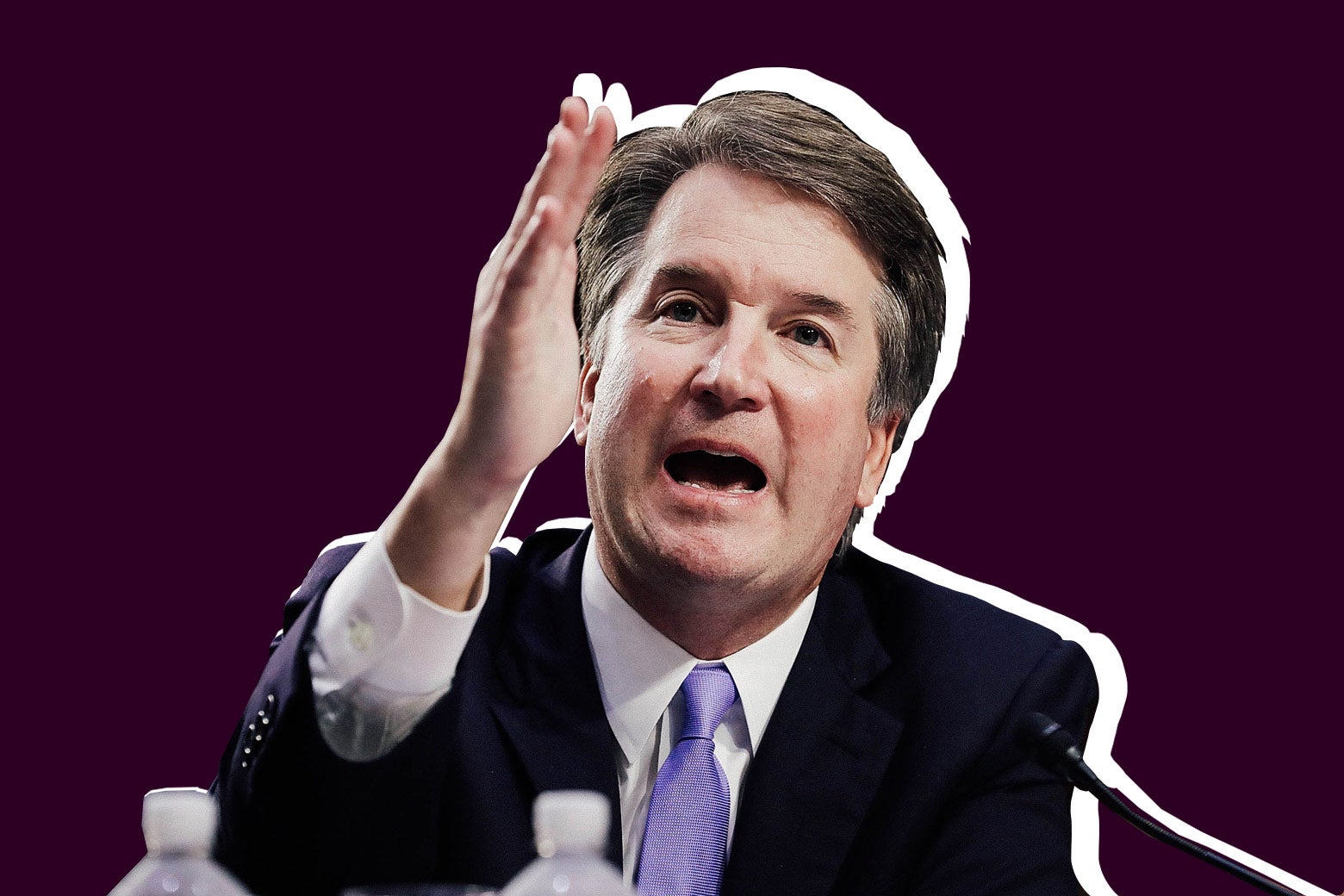 Brett Kavanaugh raising his hand in front of his face while testifying at his Supreme Court confirmation hearing.