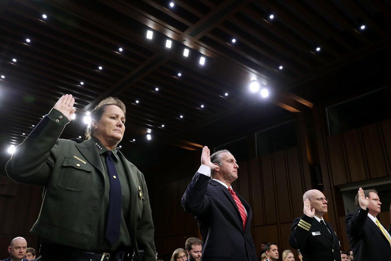 Officials are sworn in for a hearing on family separation, a policy for which nobody is apparently to blame.