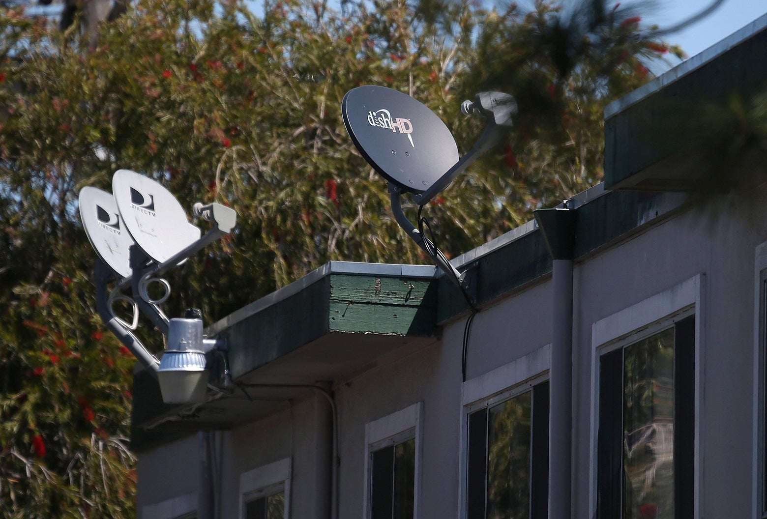 AT&T agrees to buy DirecTV for nearly 50 billion.