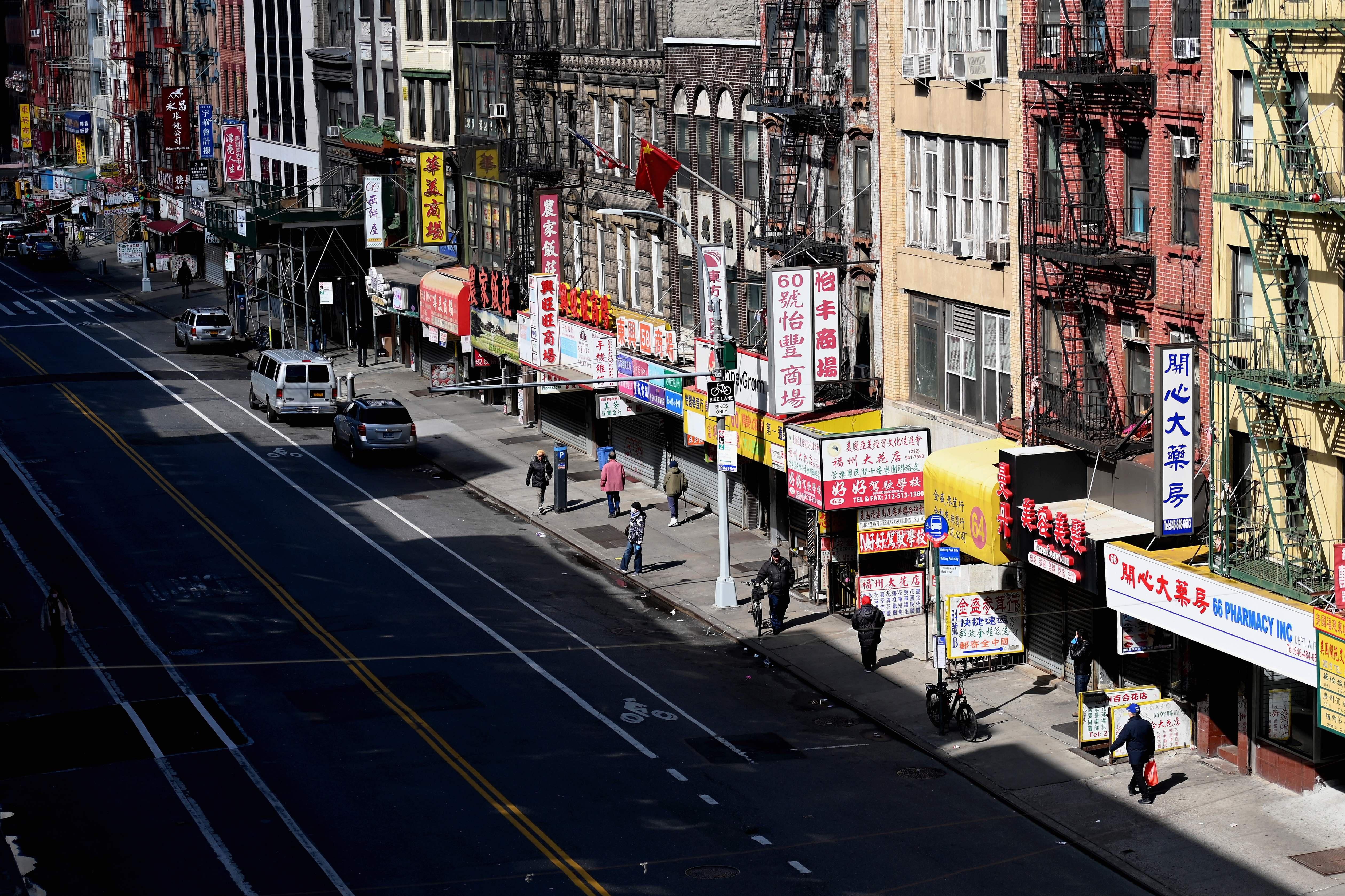 A nearly empty street in Chinatown on March 24, 2020 in New York City. - US lawmakers closed in on a deal Tuesday to help save the teetering economy by injecting nearly $2 trillion into pockets of struggling Americans, devastated businesses and hospitals struggling to contain the coronavirus pandemic. (Photo by Angela Weiss / AFP) (Photo by ANGELA WEISS/AFP via Getty Images)