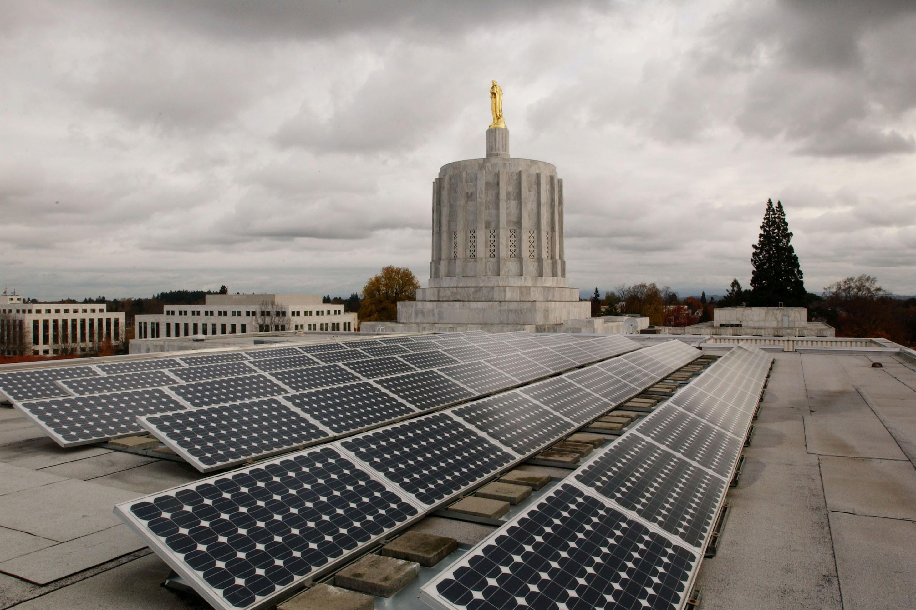 Several solar panels on the roof of the Oregon State Capitol building