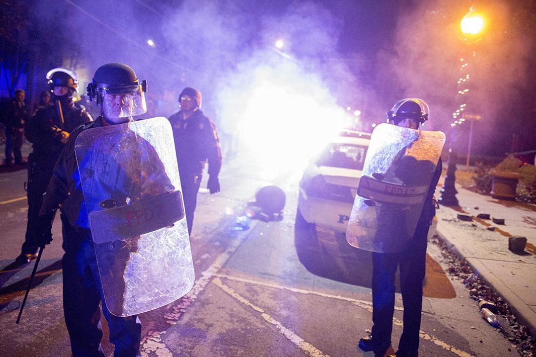 photos of ferguson protests after indictment of officer darren wilson in michael brown case.