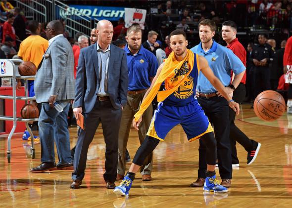 Stephen Curry #30 of the Golden State Warriors comes out of the locker room after halftime and warms up during Game Four of the Western Conference Quarterfinals against the Houston Rockets during the 2016 NBA Playoffs on April 24, 2016 at the Toyota Center in Houston, Texas.