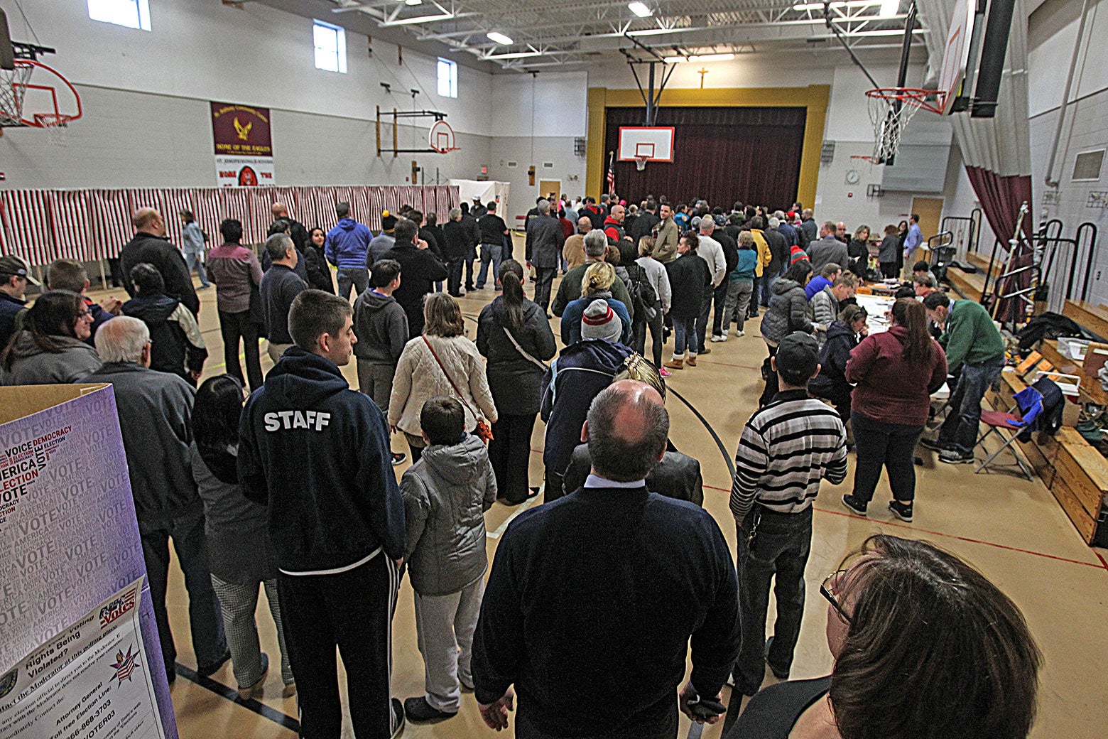 People wait in long lines to vote at Memorial High School in Manchester, New Hampshire, on Nov. 8, 2016.