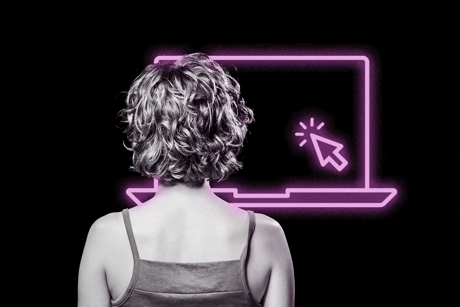 Woman seen from behind, looking at a laptop screen.