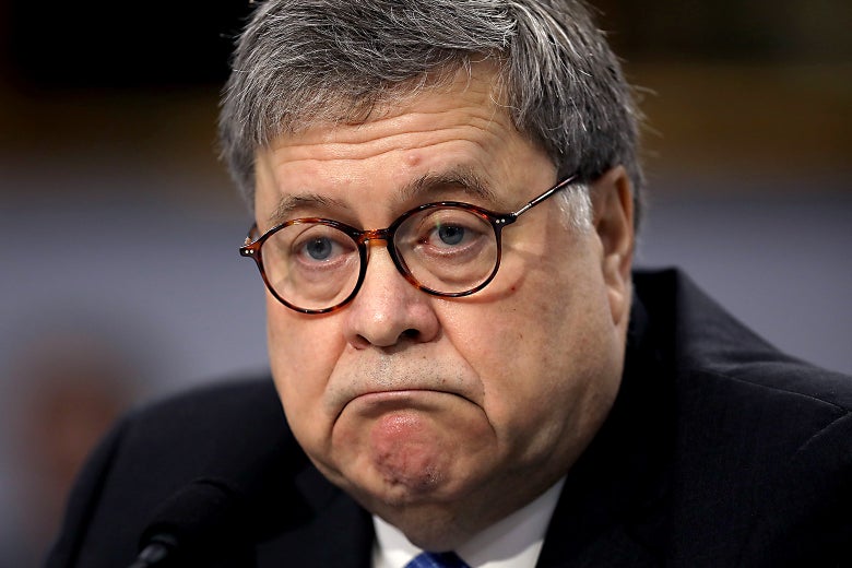 U.S. Attorney General William Barr looks off-camera while on Capitol Hill on Tuesday.