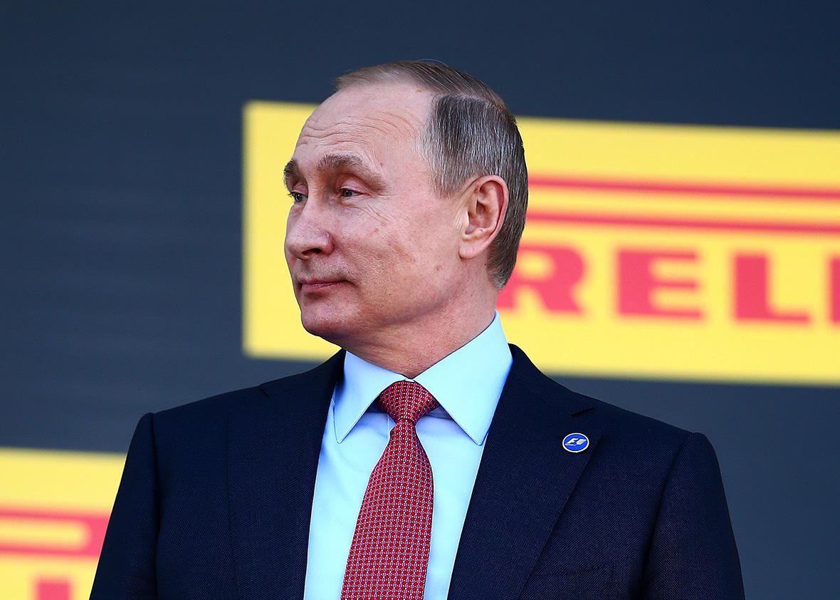 Russian President Vladimir Putin looks on from the podium after the Formula One Grand Prix of Russia at Sochi Autodrom on May 1, 2016 in Sochi, Russia.  