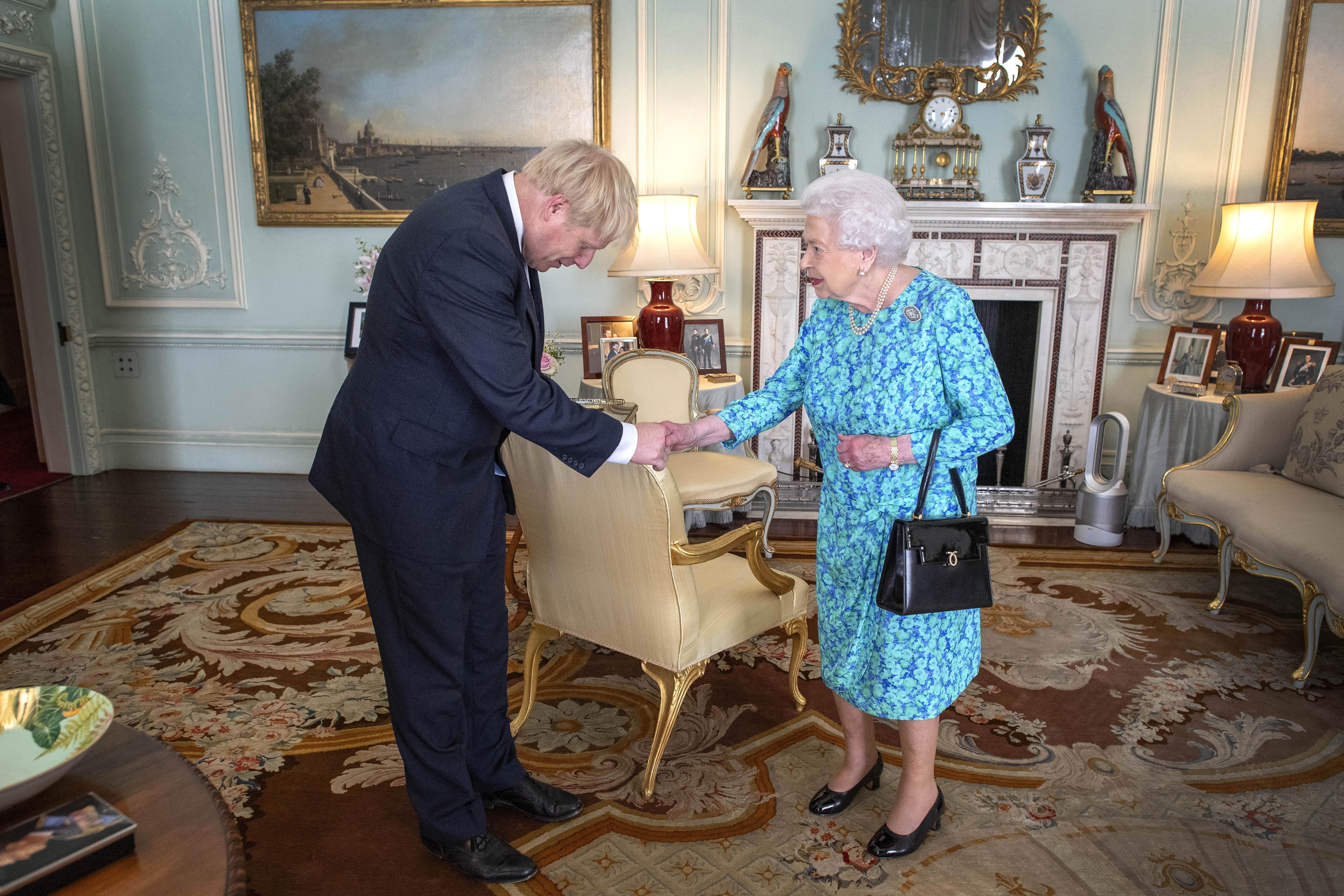Queen Elizabeth II welcomes Boris Johnson.