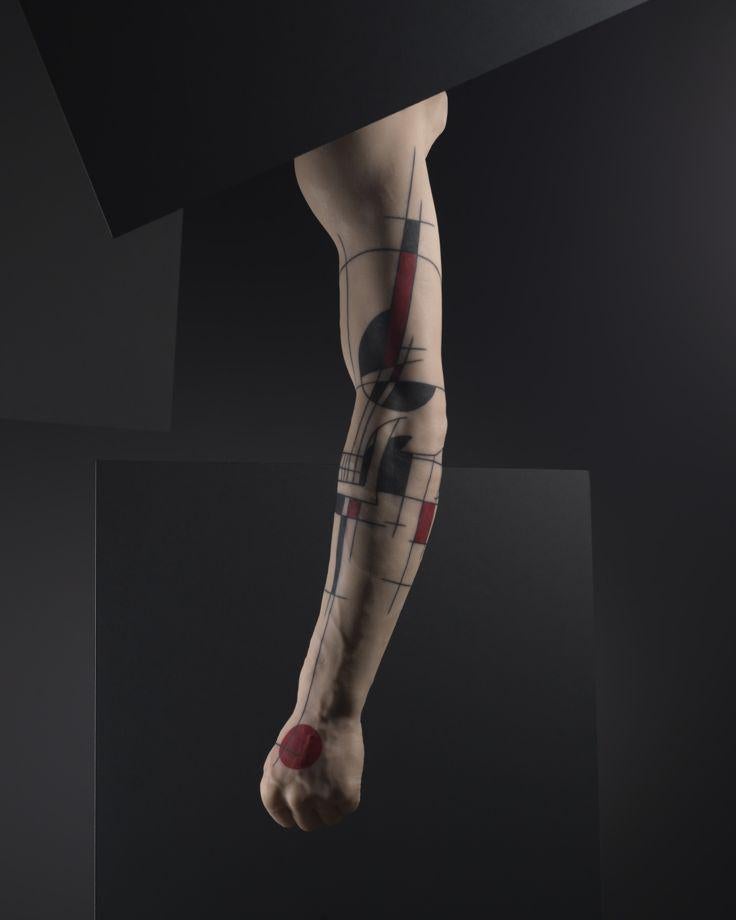 Montreal-based tatoo artist Yann Black's design on the silicone model of a man's arm.