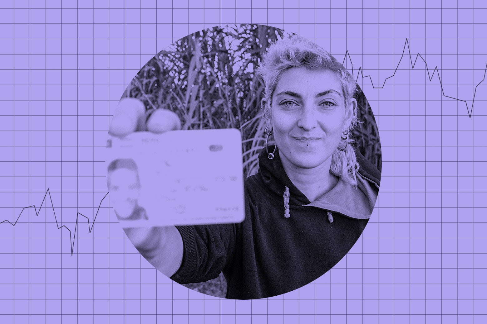 A person holding an ID card. 